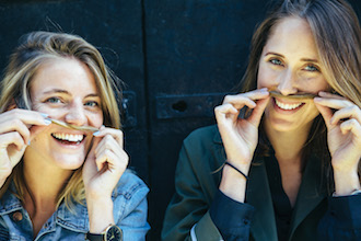 Two women with mustache - Movember Foundation